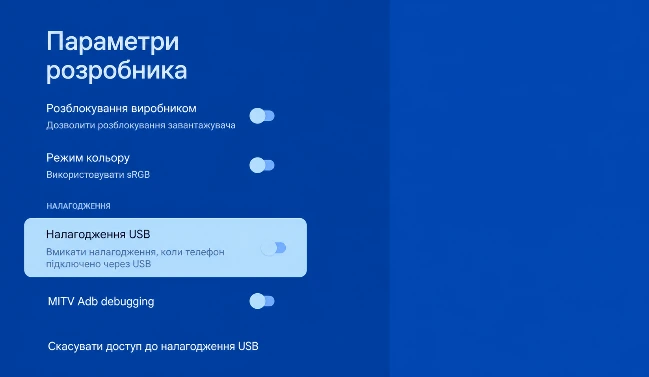 W Opcjach programistycznych włącz Debugowanie USB i potwierdź przyciskiem OK.